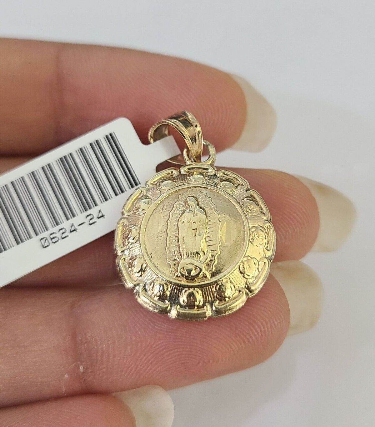 Virgin Mary necklace worn