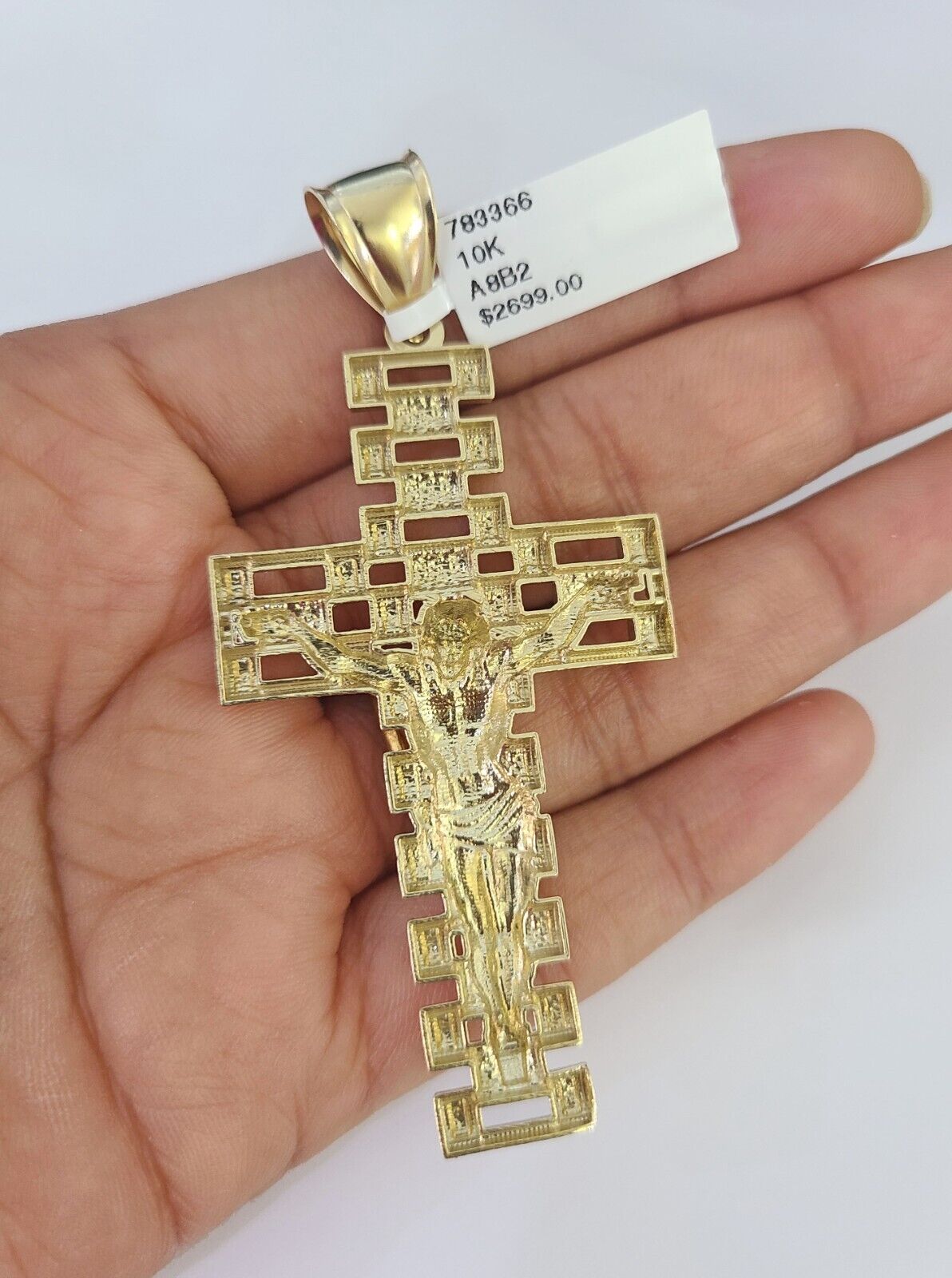 Detailed macro shot of 10K yellow gold Franco chain links