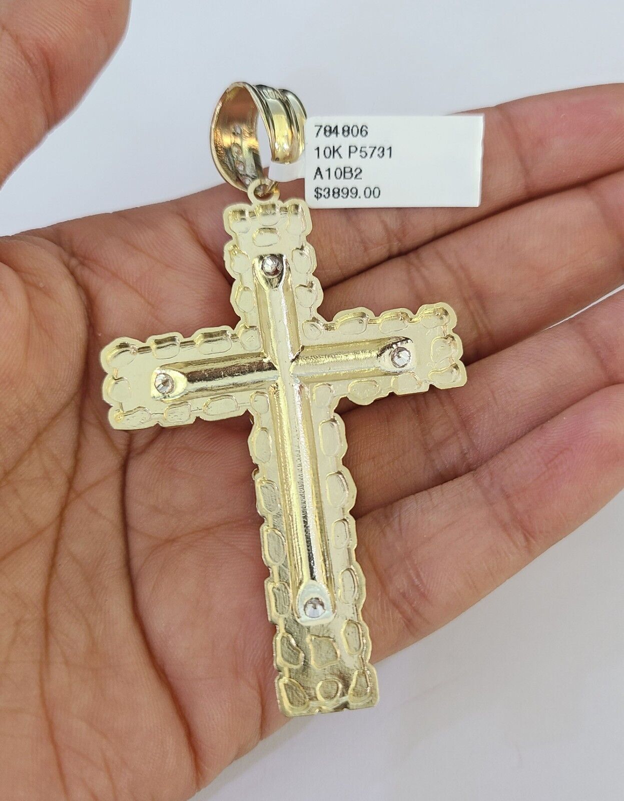 Detailed macro shot of 10K yellow gold Franco chain links