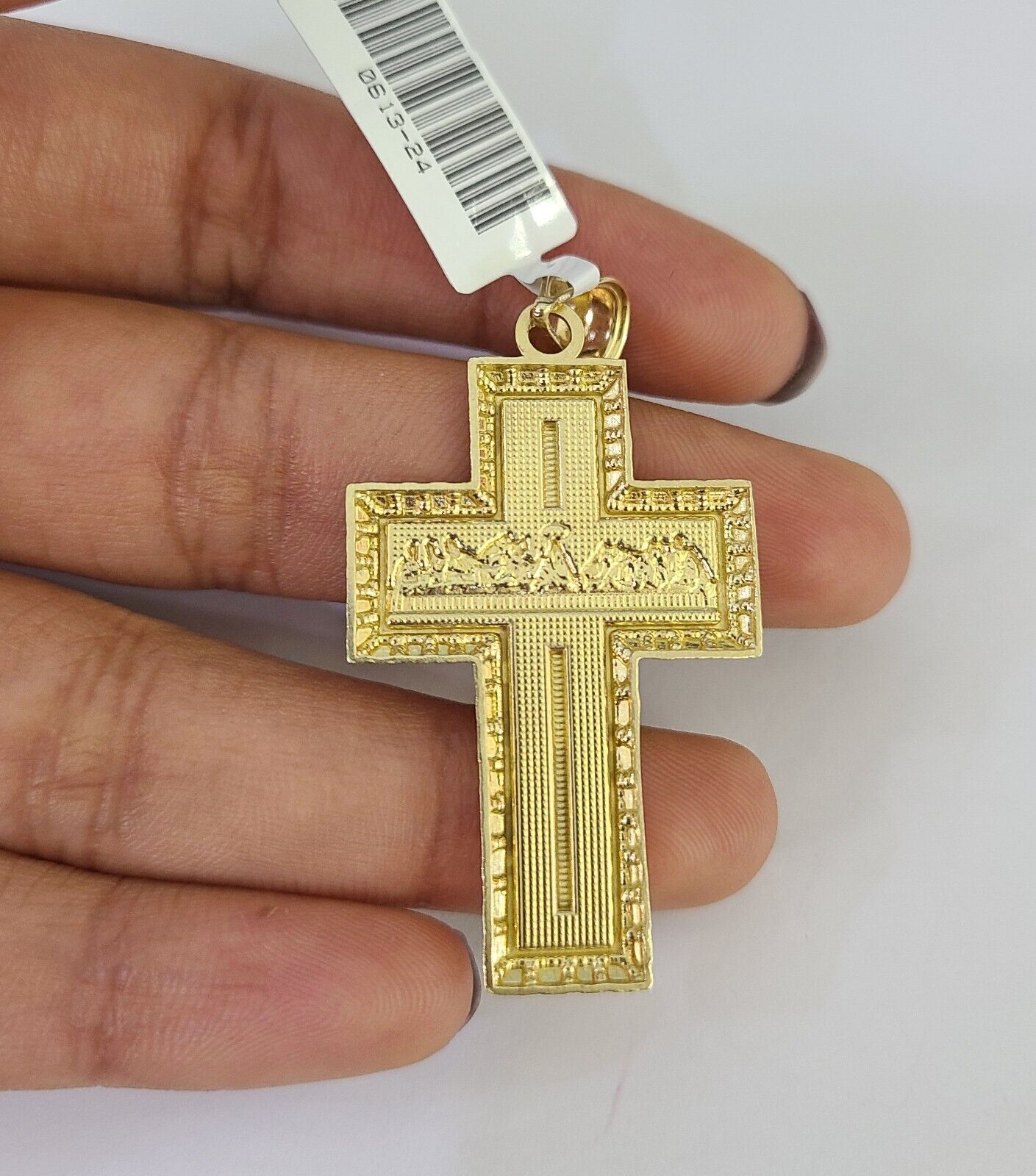 Detailed macro shot of 10K yellow gold Franco chain links