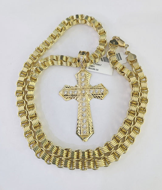 Close-up detailed view of 10K gold Jesus cross pendant charm
