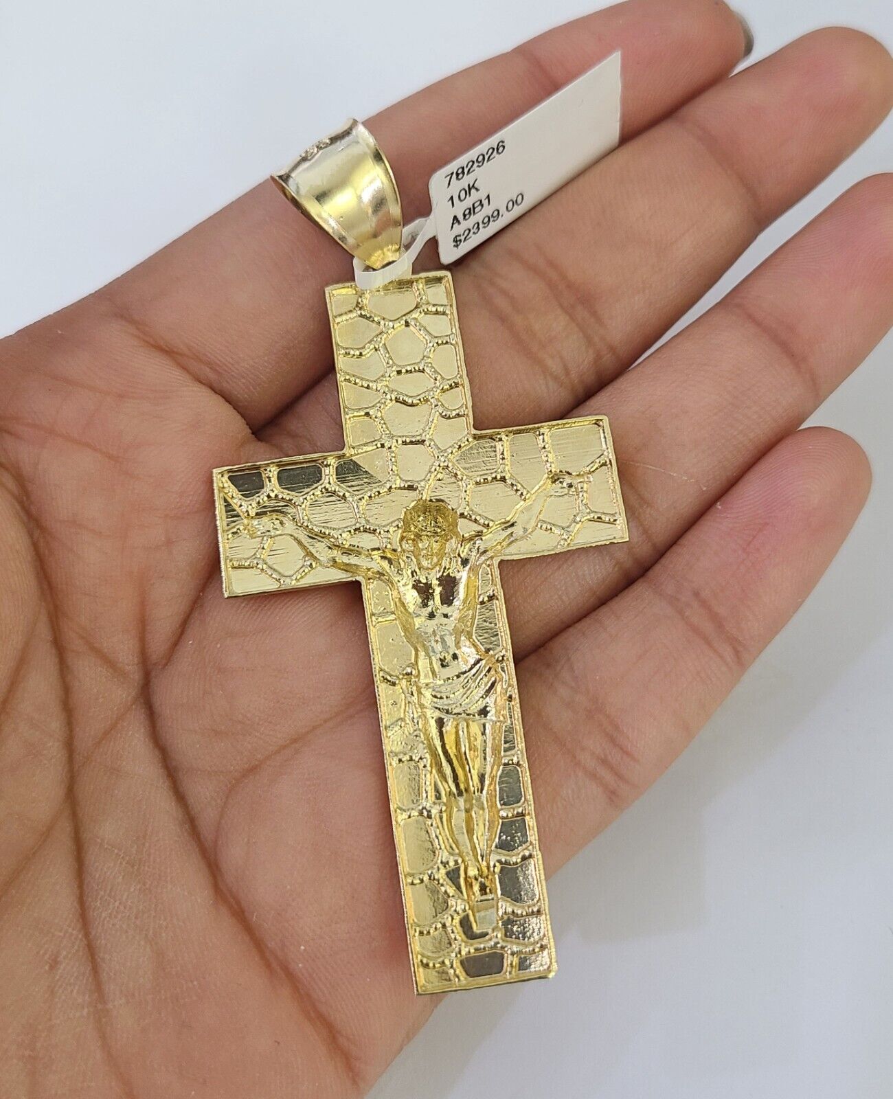 Side angle view of Franco chain necklace featuring Jesus cross pendant charm