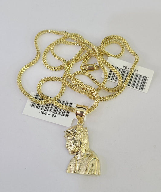 Close-up detailed view of 10K yellow gold Jesus head pendant charm