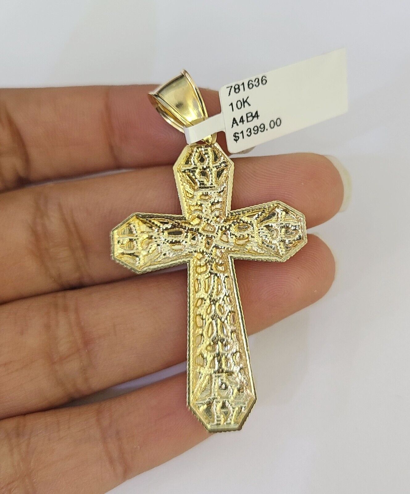 Flat lay of Jesus cross necklace