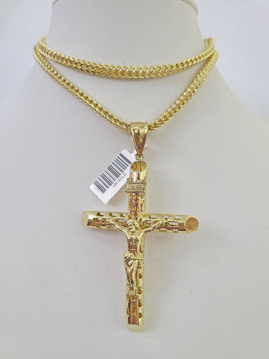 Close-up detailed view of 10K yellow gold INRI Jesus cross pendant charm