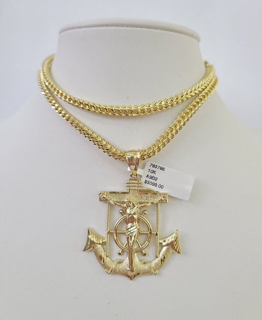 Close-up detail of Jesus anchor pendant in 10K gold jewelry design