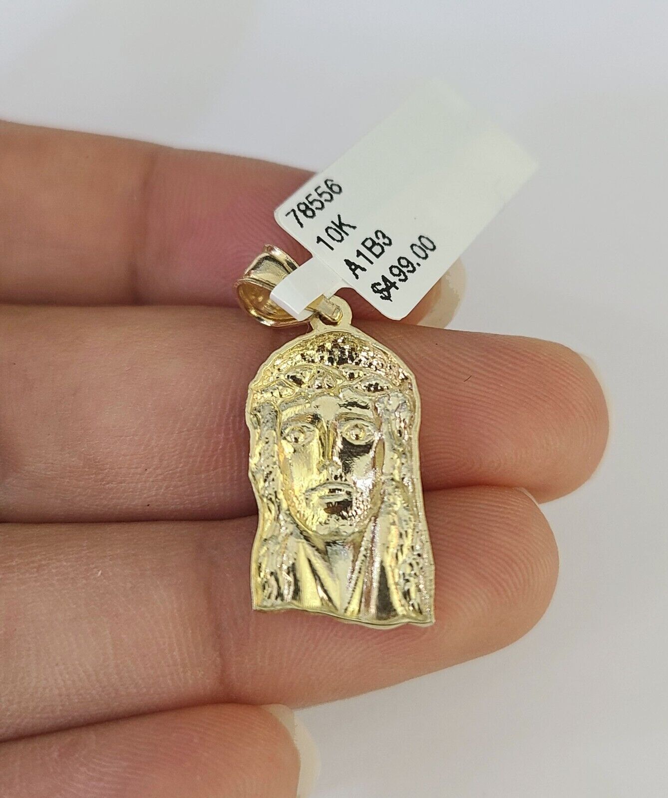 Angled Jesus head pendant
