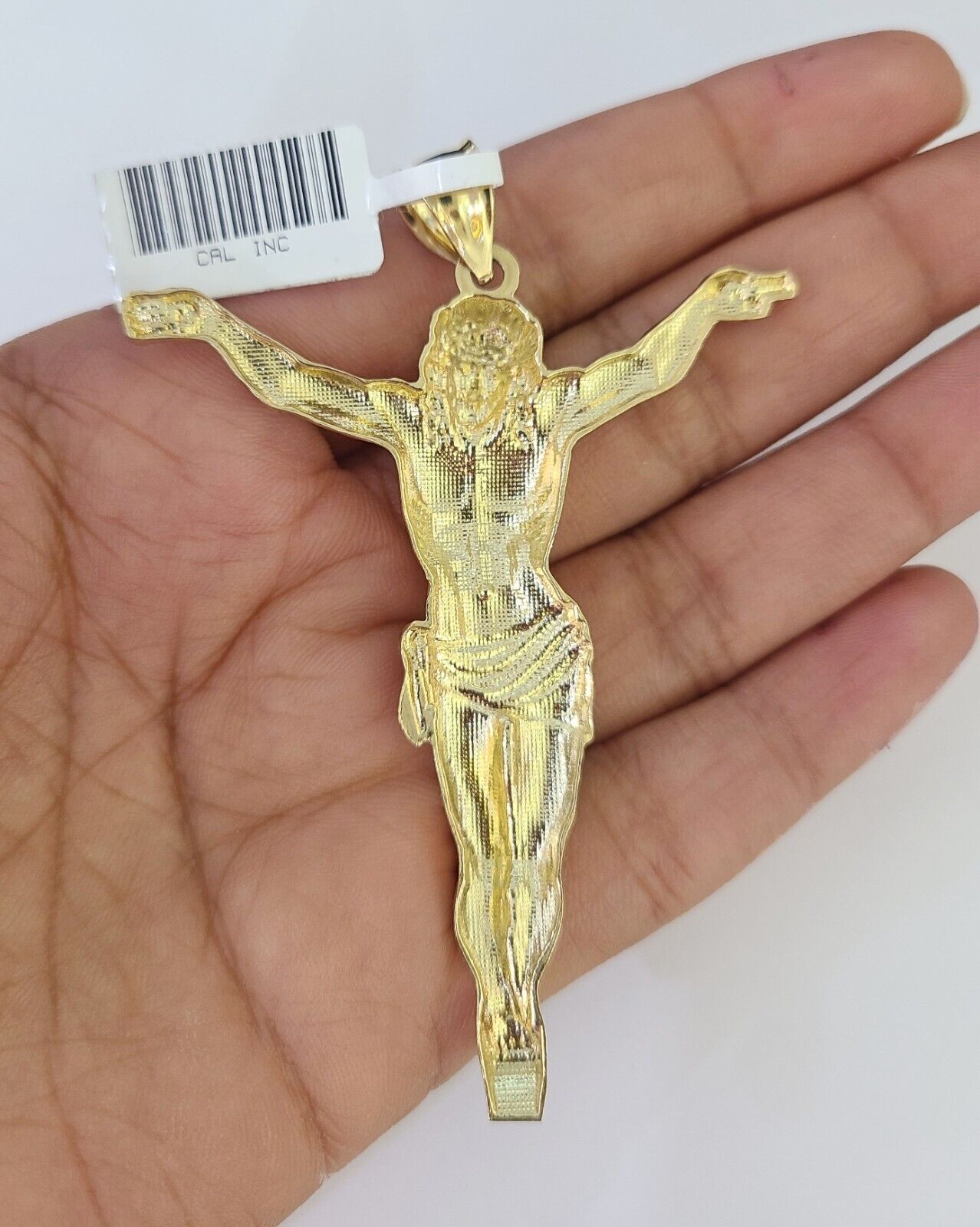 Detailed macro shot of 10K yellow gold Franco chain links
