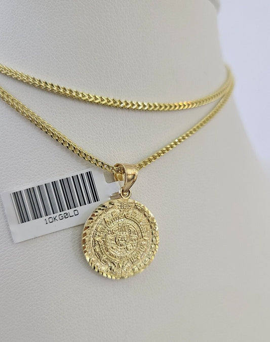 Side angle view of 10K gold Mayan calendar pendant on Franco chain