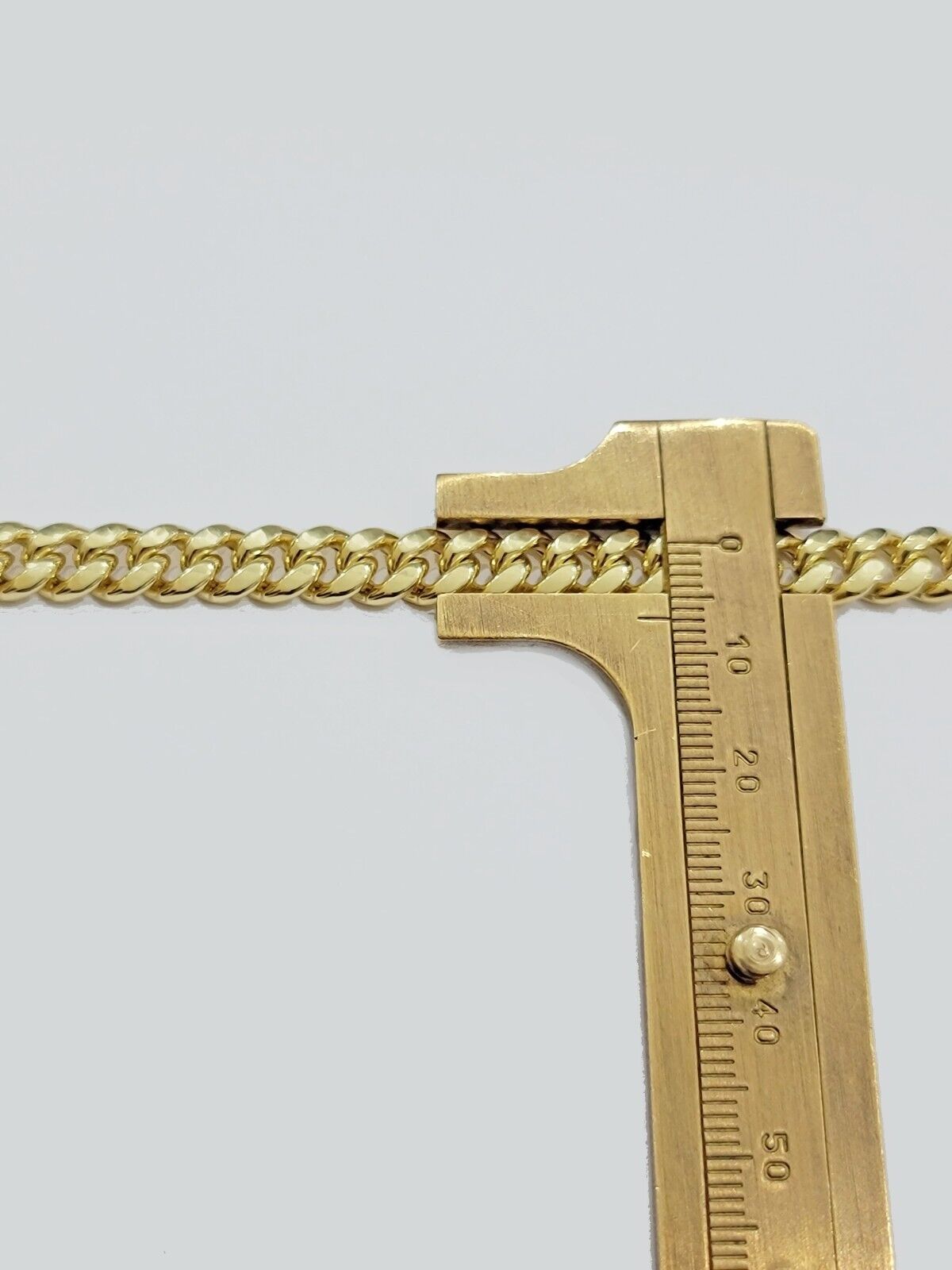 Real 10k Gold Chain 7mm 22 Inch Miami Cuban Link Box Clasp Mens 10kt Yellow Gold - Reva Jeweler