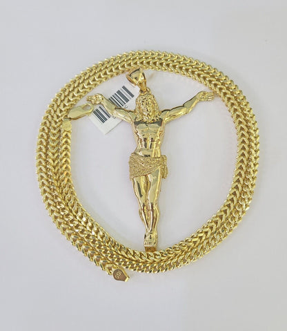 Side angle view of 10K yellow gold Jesus pendant on Franco chain