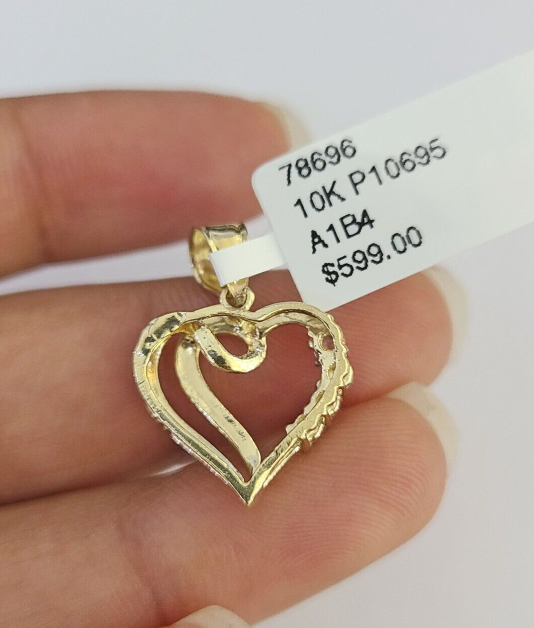 Heart pendant studio view