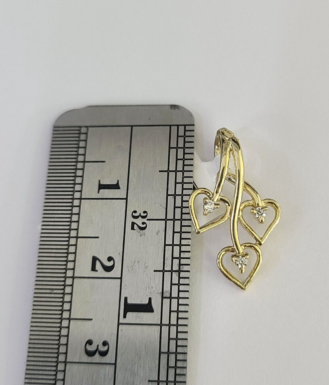 Side view of hearts pendant