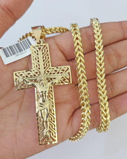 Close-up of 10K gold Jesus cross pendant charm from Reva Jeweler