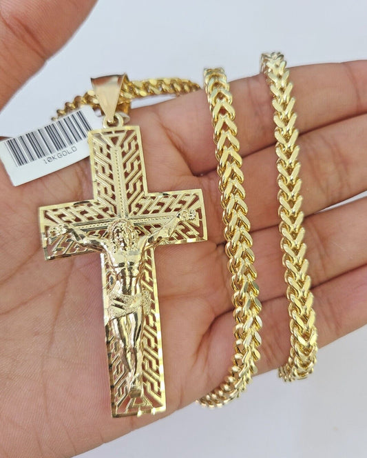 Close-up of 10K gold Jesus cross pendant charm from Reva Jeweler