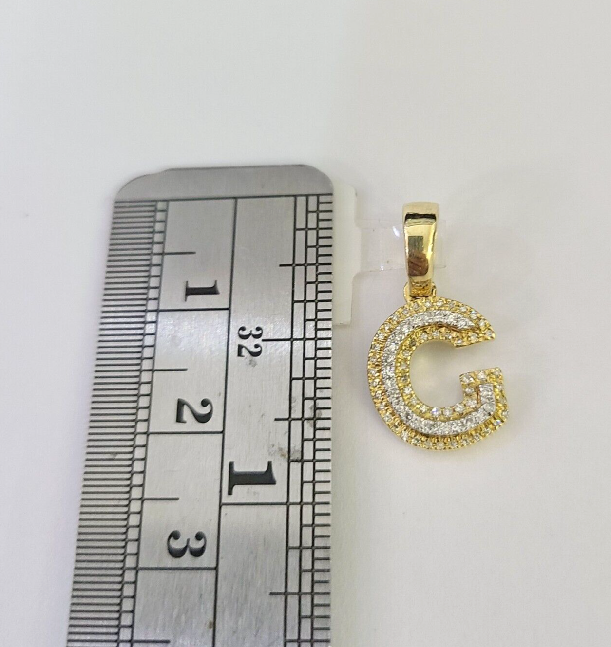 G initial pendant necklace worn