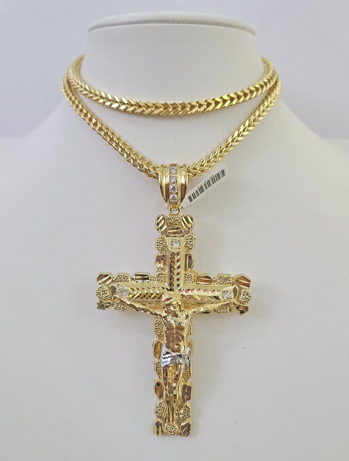 Detailed macro shot of 10K yellow gold Franco chain links