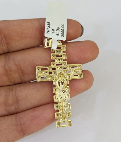 Close-up of 10K yellow gold Jesus cross pendant on Franco chain necklace