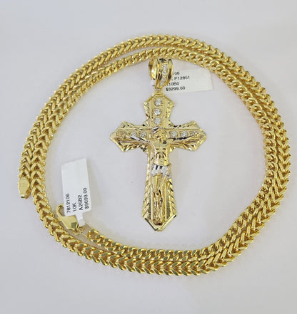 Full set display of the 10K yellow gold Franco chain and Jesus cross pendant