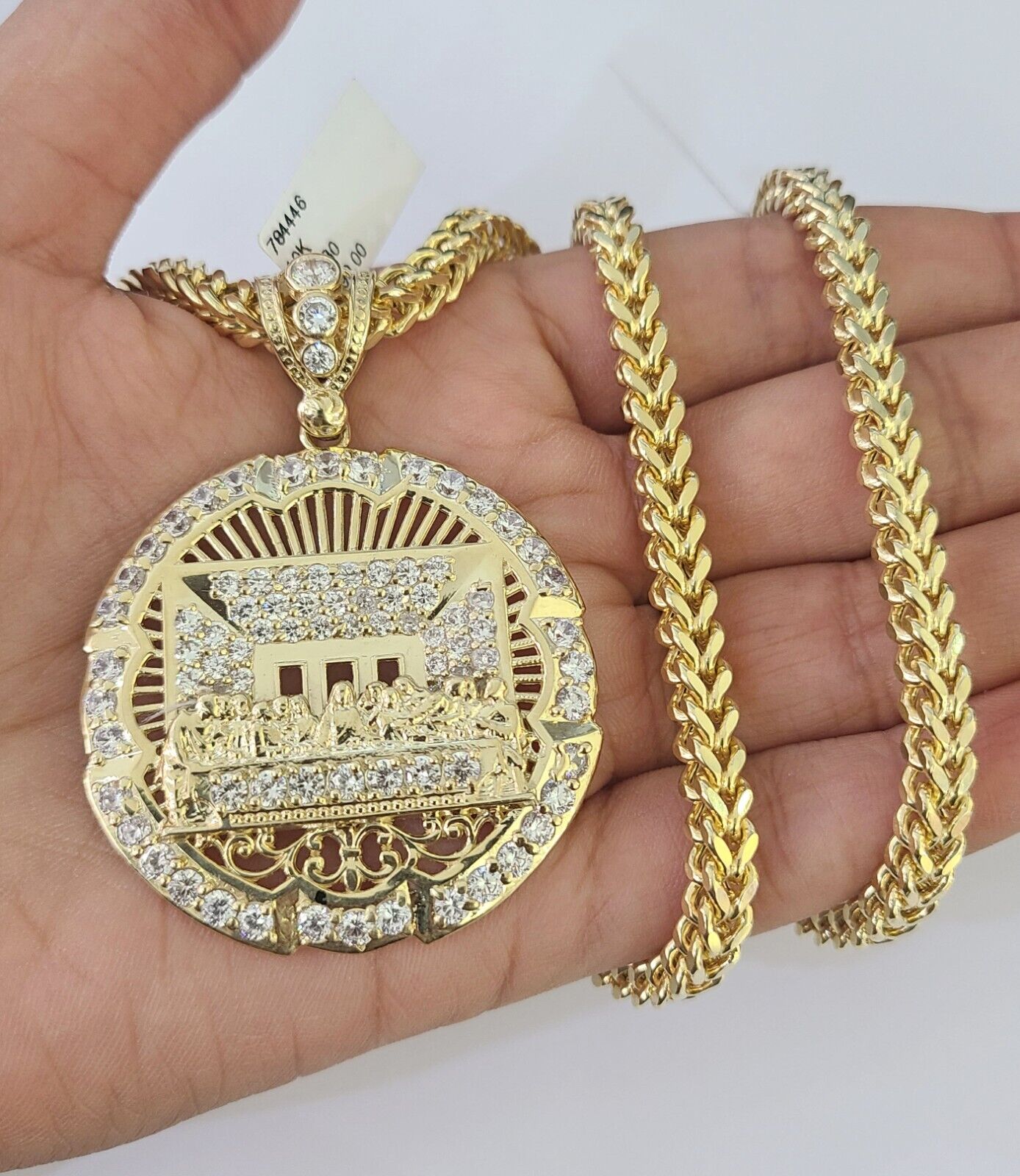 Front-facing view of Reva Jeweler 10K gold Last Supper pendant and chain