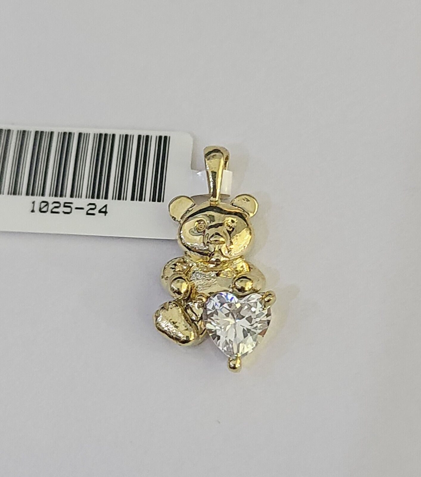 Teddy bear pendant craftsmanship detail