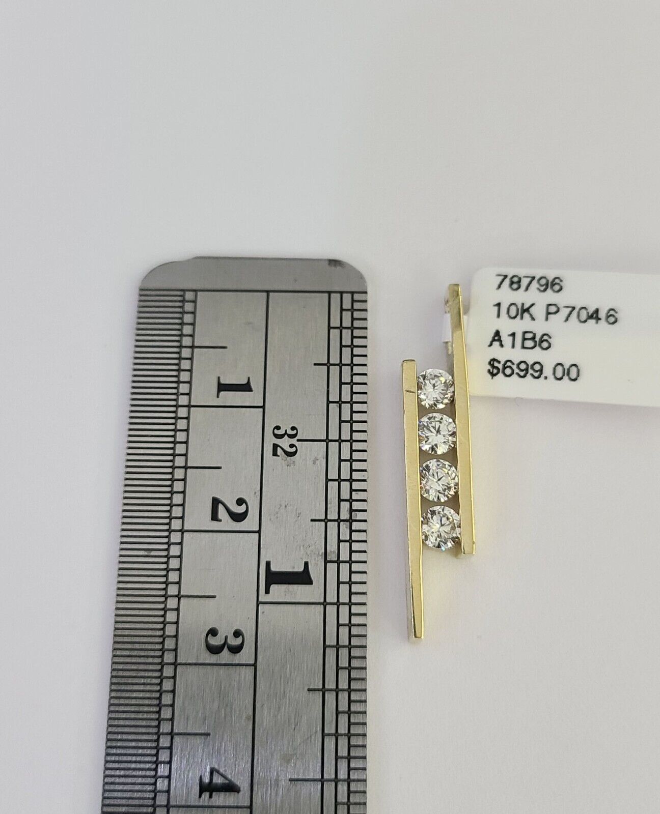 Full four-stone pendant view