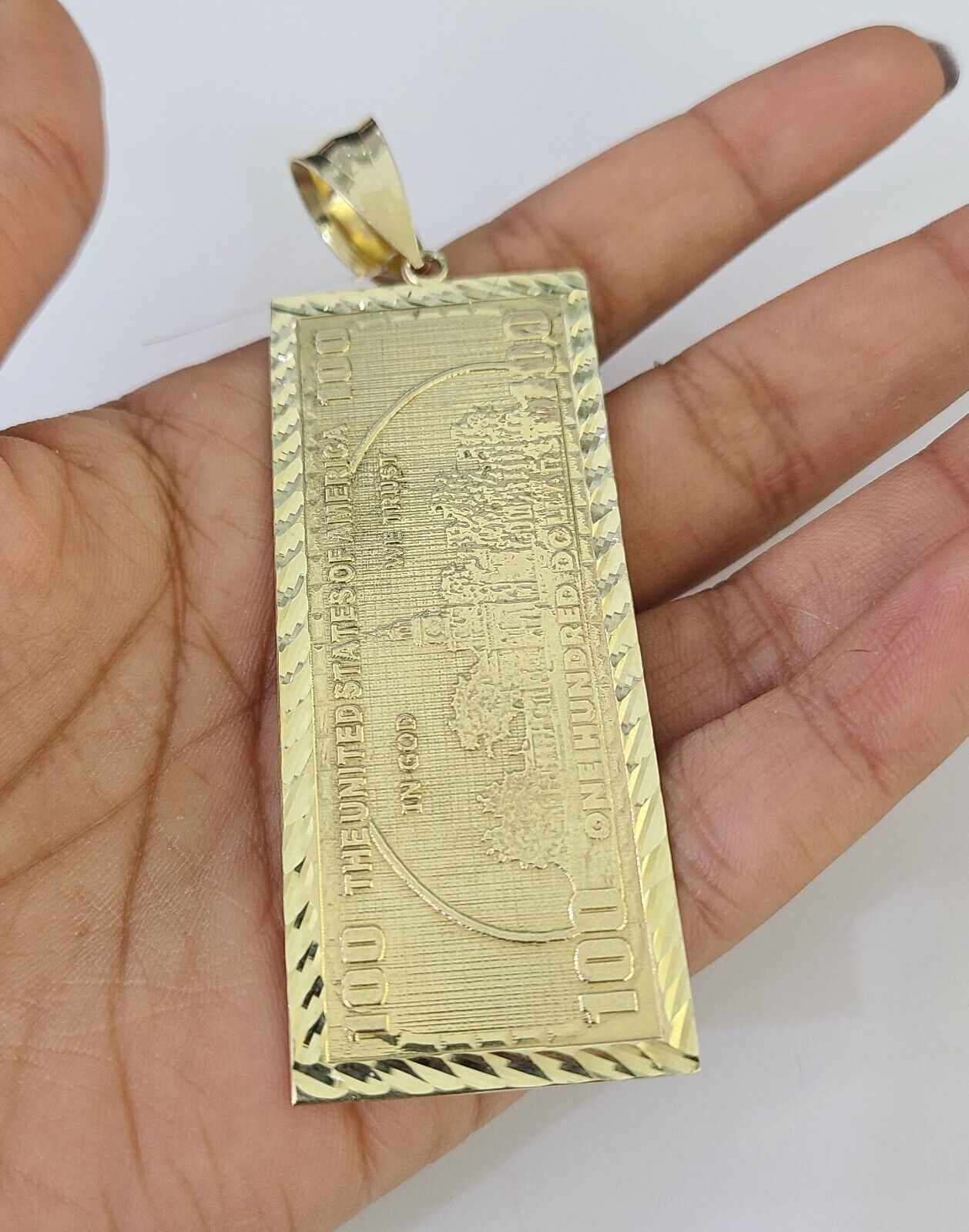 Polished 10K gold money pendant charm necklace on Franco chain links