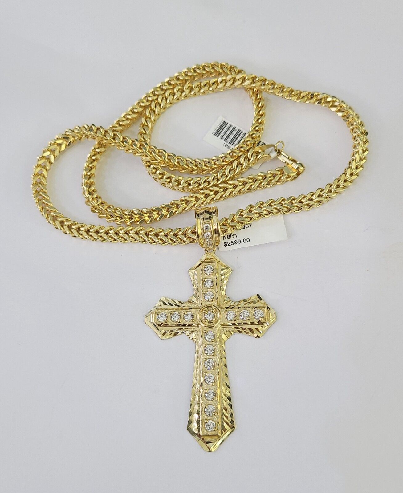 Luxury 10K gold Franco chain necklace with Jesus cross pendant by Reva Jeweler
