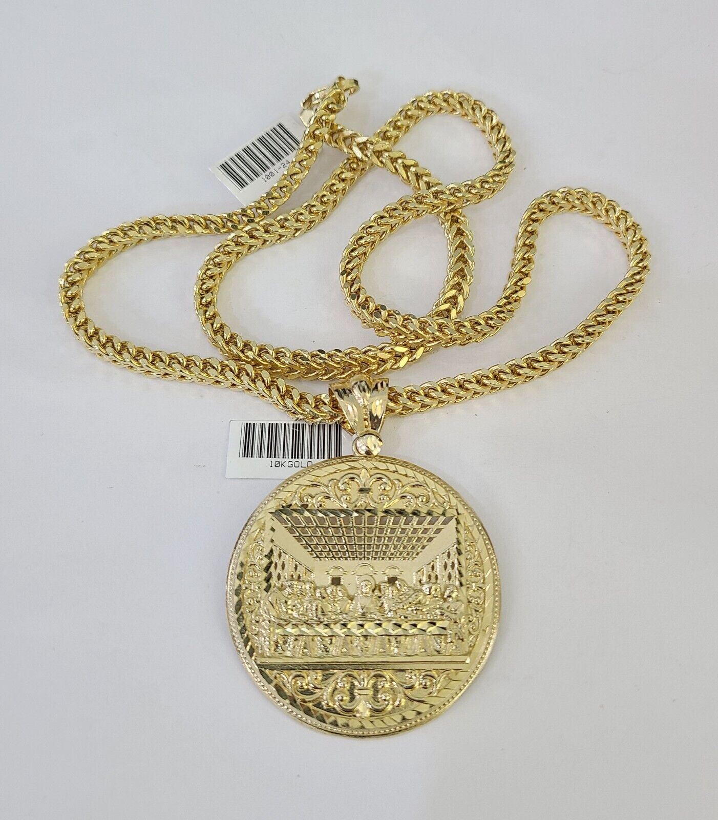 Detailed macro shot of 10K yellow gold Franco chain links