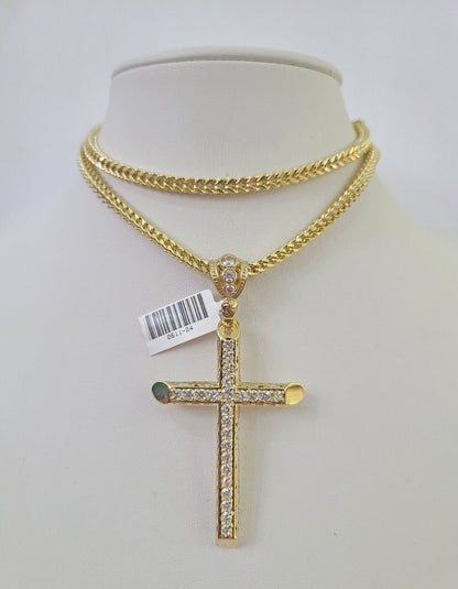 Close-up detailed view of 10K yellow gold Jesus cross pendant charm