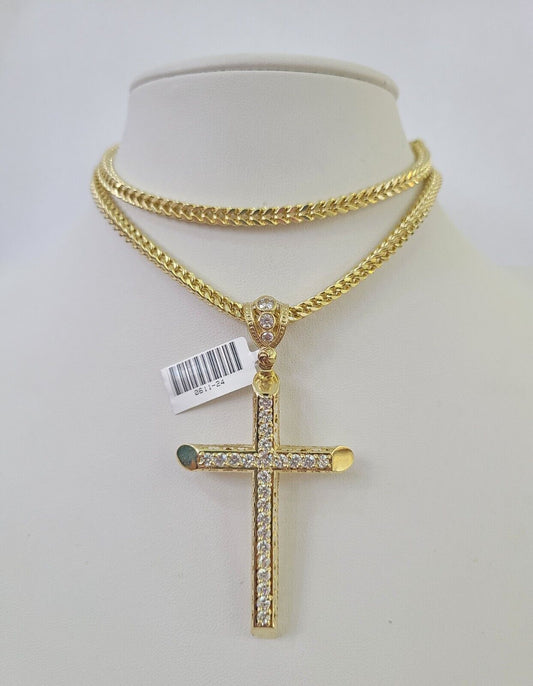 Close-up detailed view of 10K yellow gold Jesus cross pendant charm