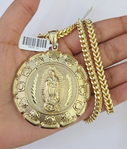Front-facing view of Reva Jeweler 10K gold Jesus and Mary pendant and chain
