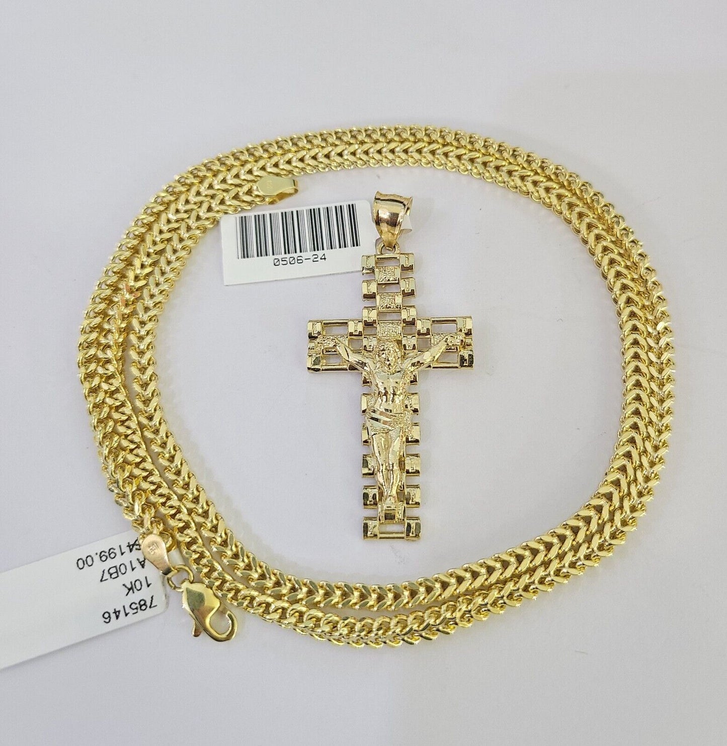 Side angle view of Franco chain necklace featuring Jesus cross pendant charm