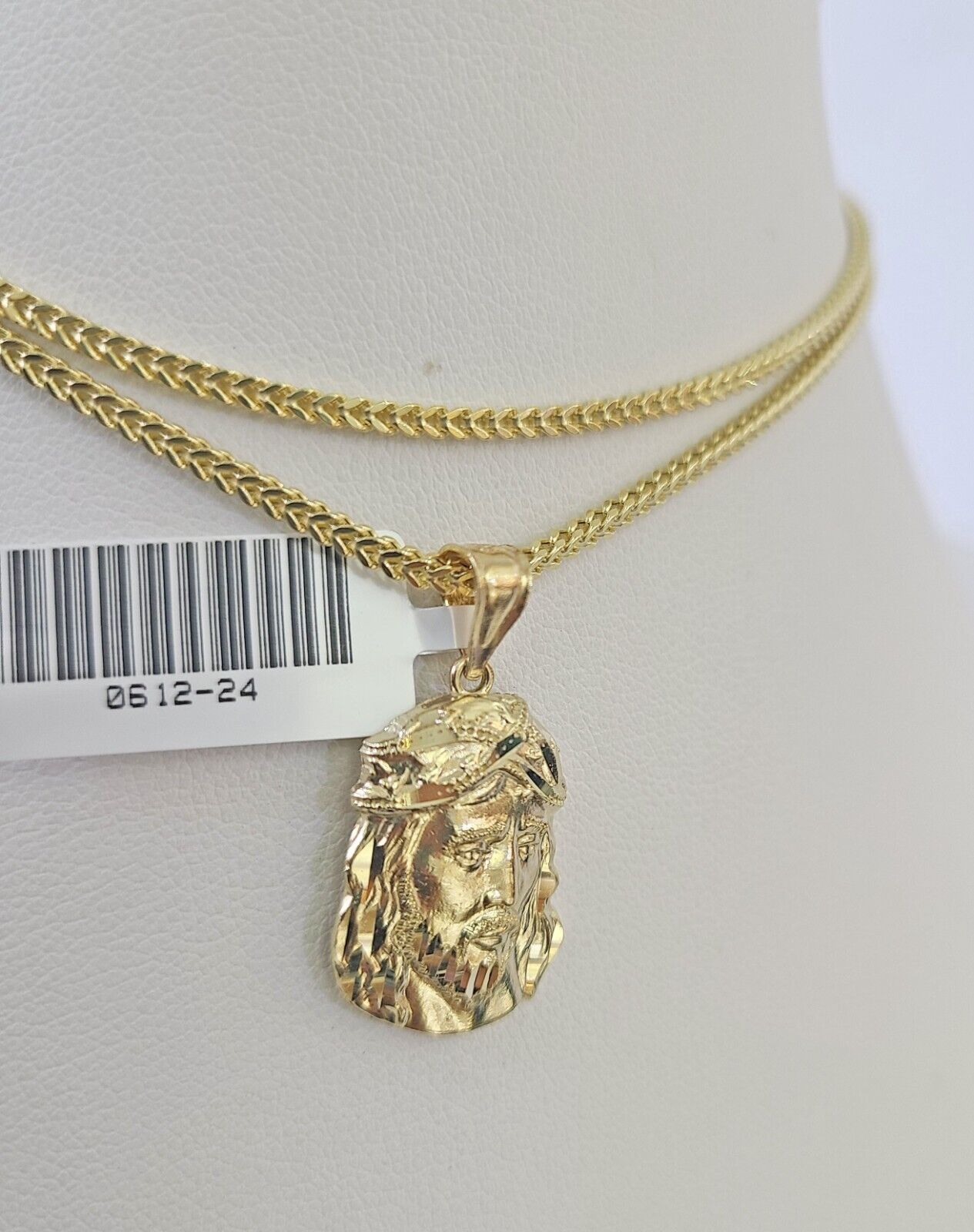 10K yellow gold Jesus head pendant and Franco chain necklace set by Reva Jeweler