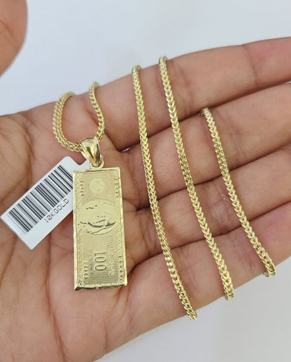 Front view of 10K gold 100 dollar pendant necklace set on Franco chain