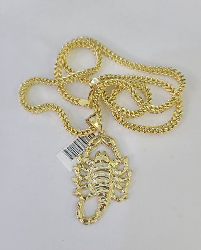 Front-facing view of Reva Jeweler 10K gold Scorpio pendant and chain