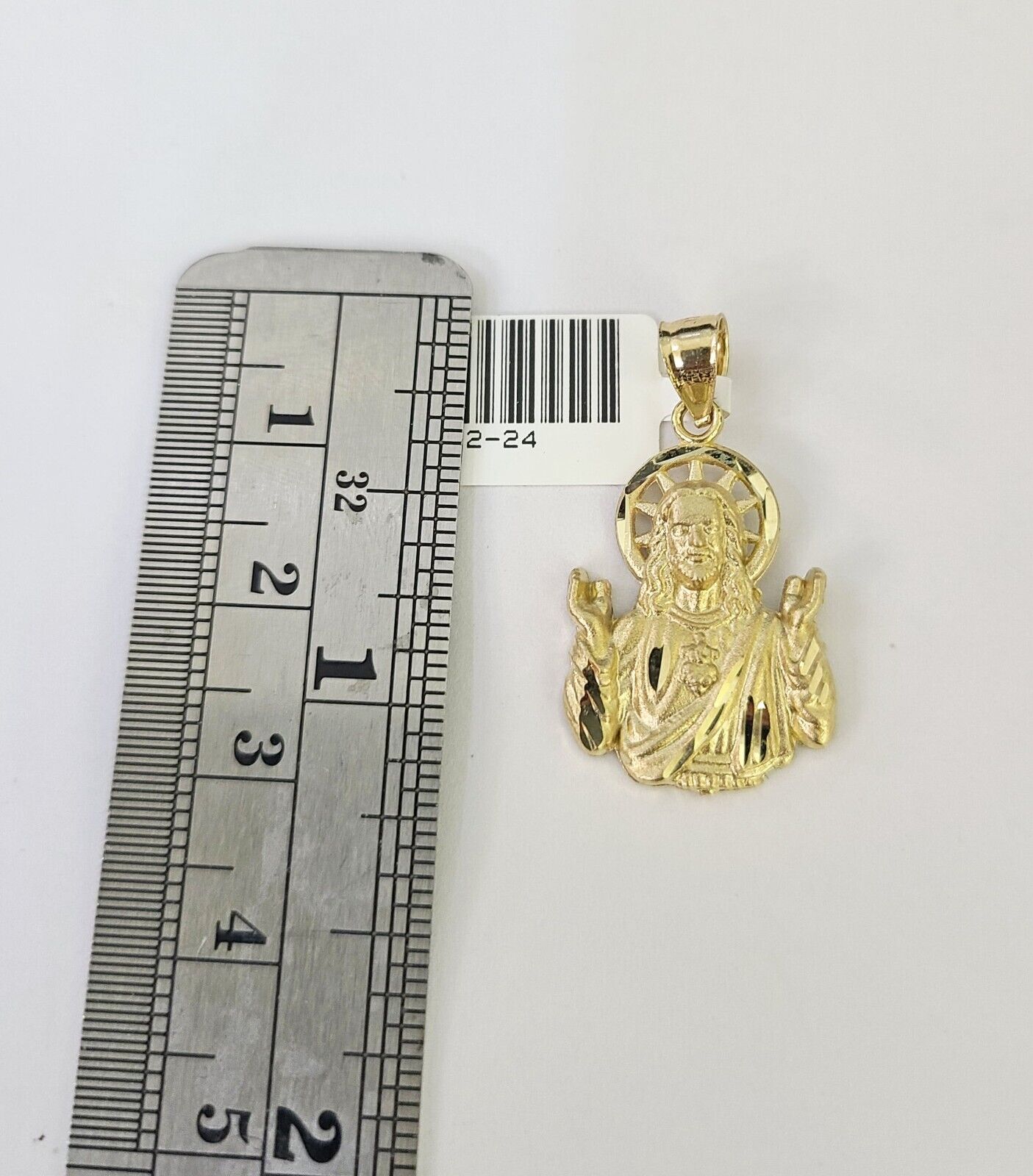 Detailed macro shot of 10K yellow gold Franco chain links