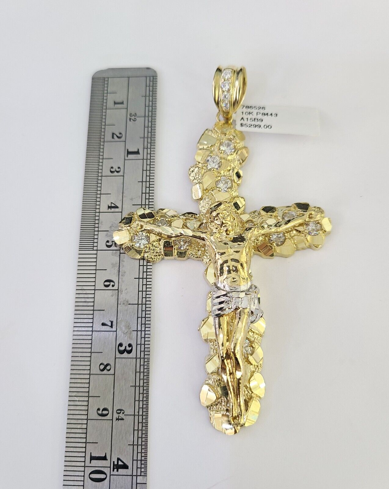 Front view of 10K yellow gold Jesus cross pendant and chain set