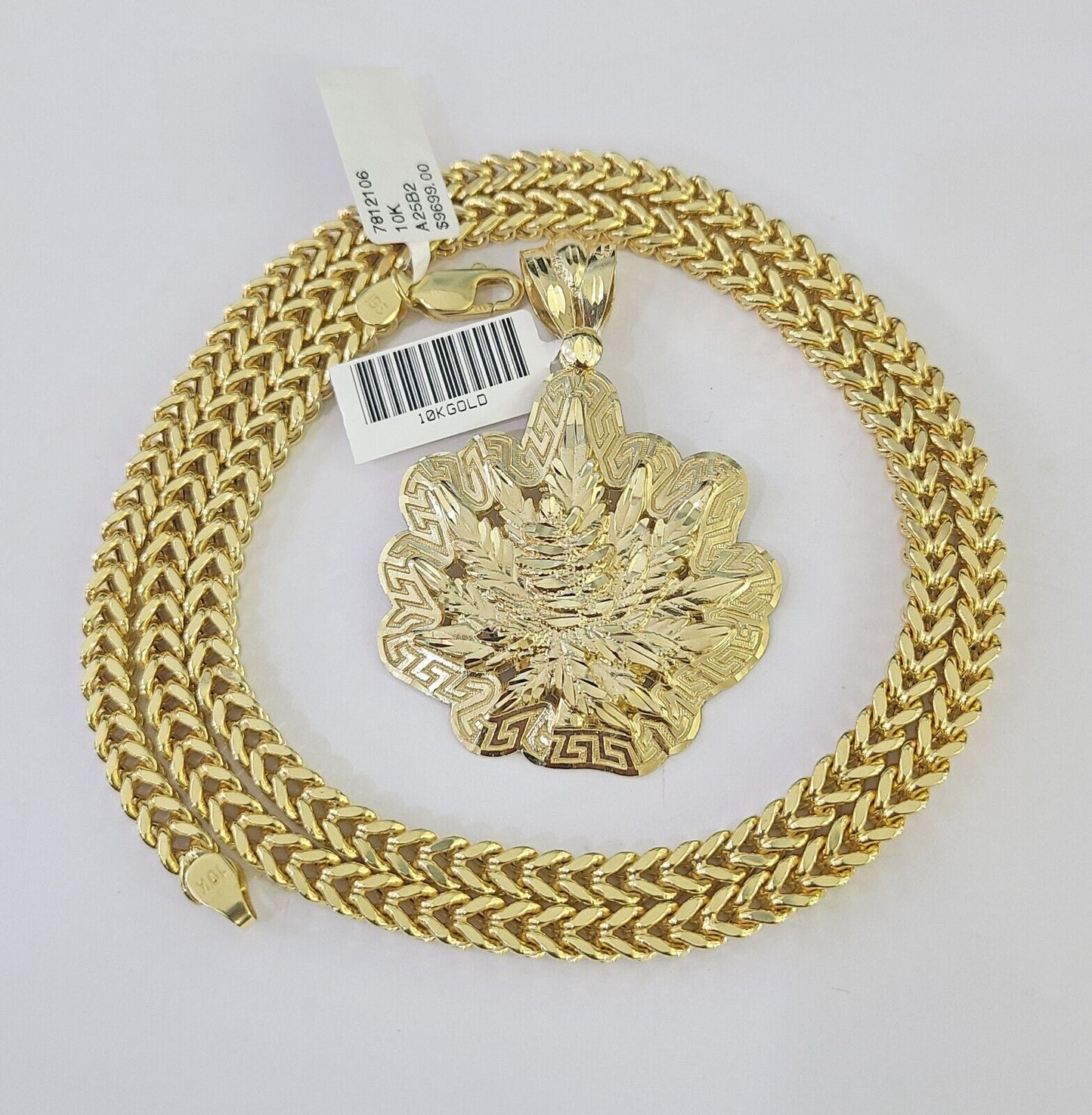 Detailed macro shot of 10K yellow gold Franco chain links