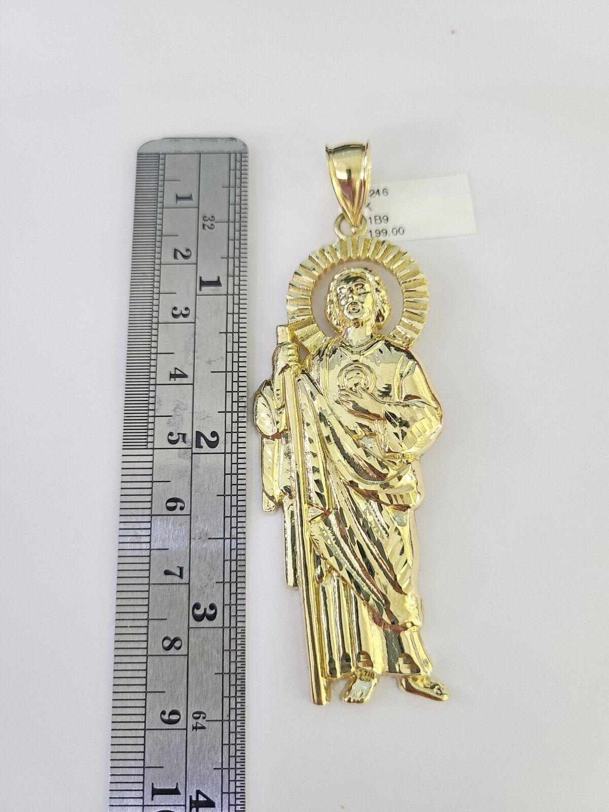 Full display of 10K yellow gold Franco chain with Saint Jude pendant