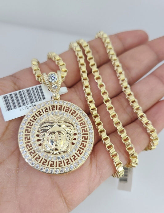 Front-facing view of Reva Jeweler 10K gold Medusa head pendant and chain