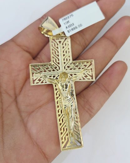 10K yellow gold Jesus cross pendant on a Franco chain necklace by Reva Jeweler