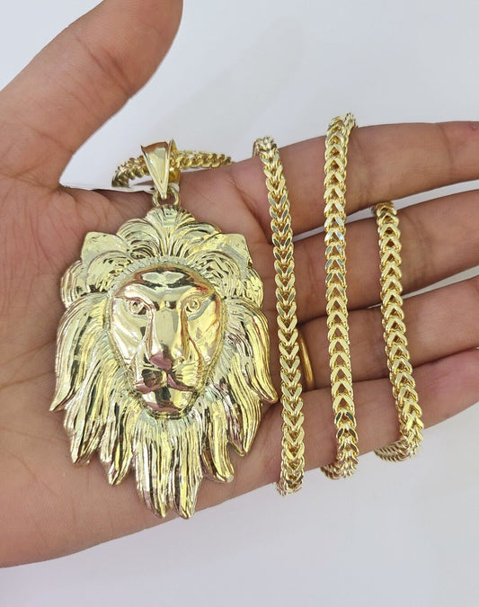 Full display of 10K yellow gold Franco chain with lion pendant