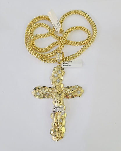 Flat lay display of the Reva Jeweler 10K yellow gold necklace set