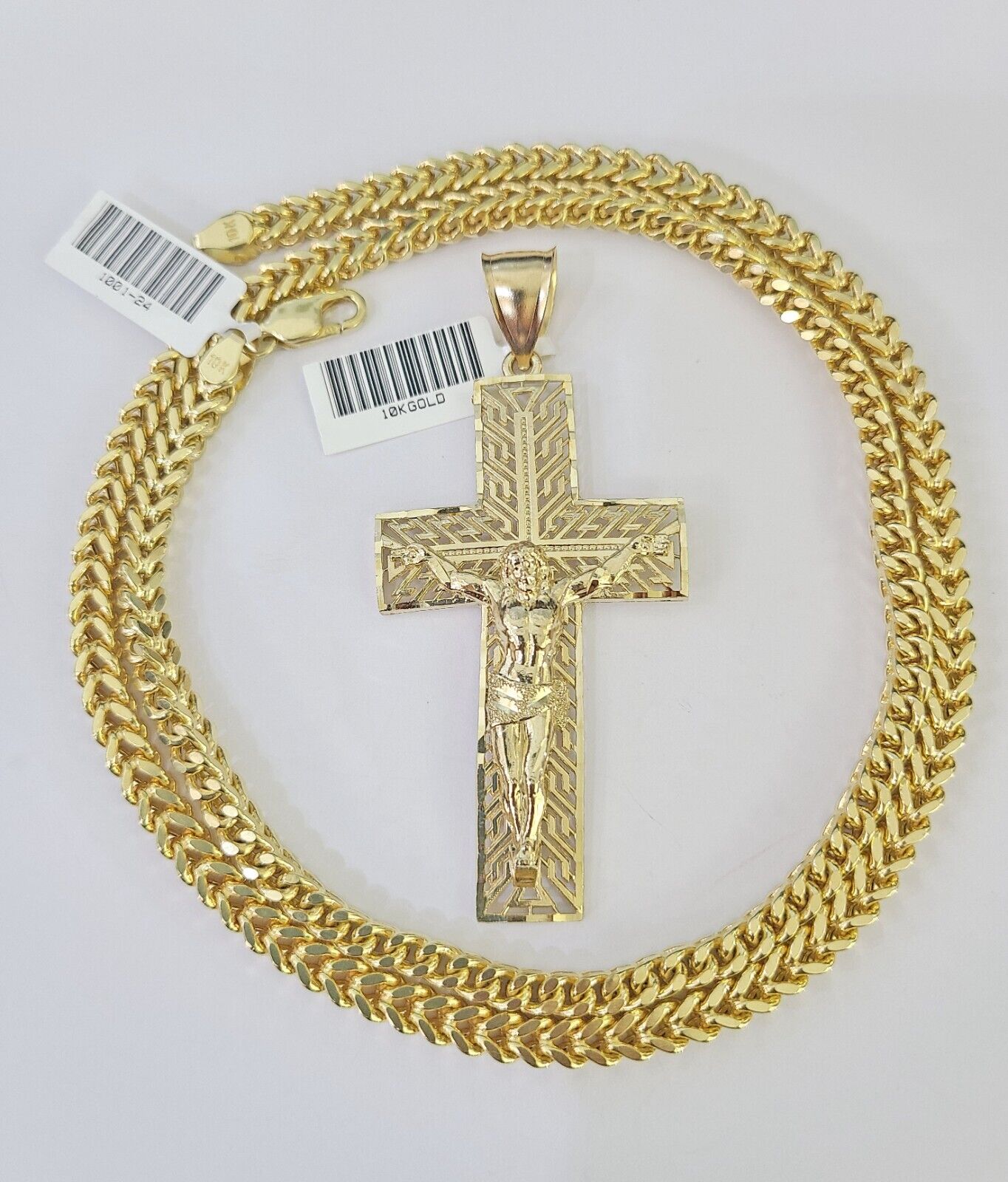 Front view of 10K yellow gold Jesus cross pendant