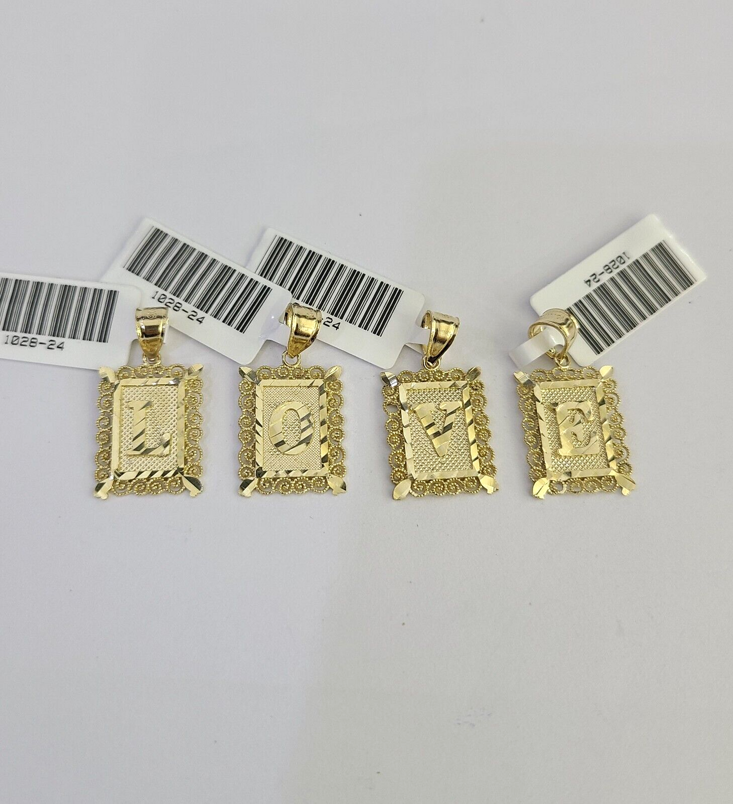 Gold letter charm bail detail