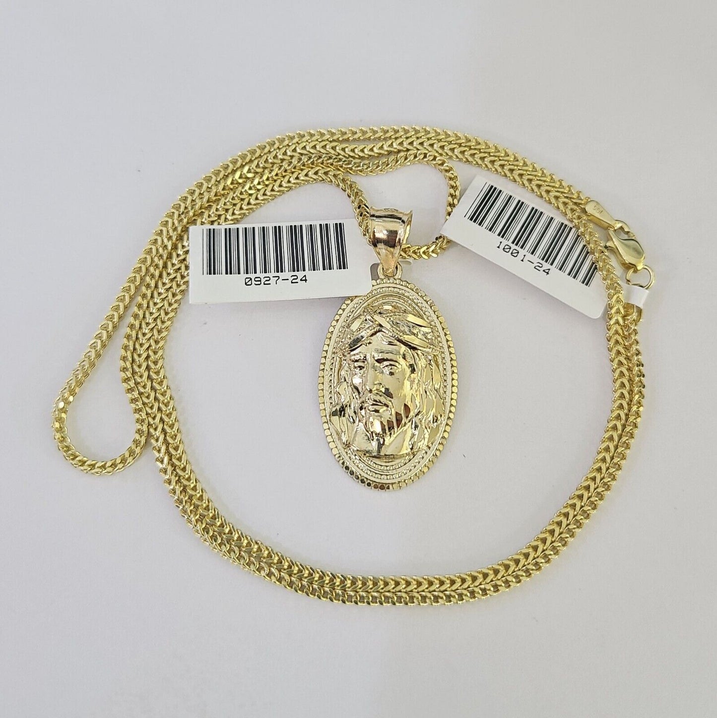 Detailed macro shot of 10K yellow gold Franco chain links