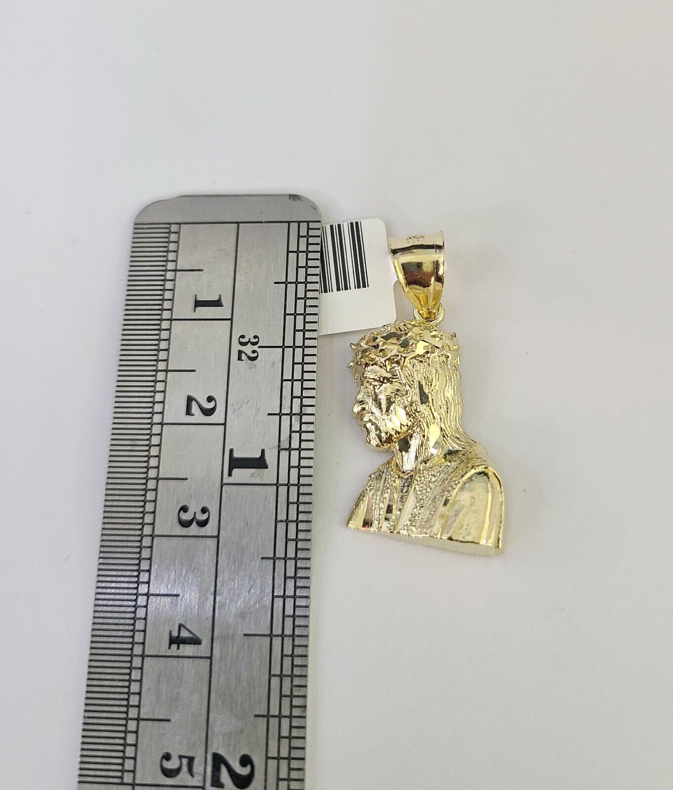 Detailed macro shot of 10K yellow gold Franco chain links