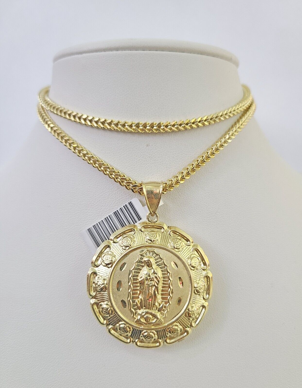 Detailed macro shot of 10K yellow gold Franco chain links