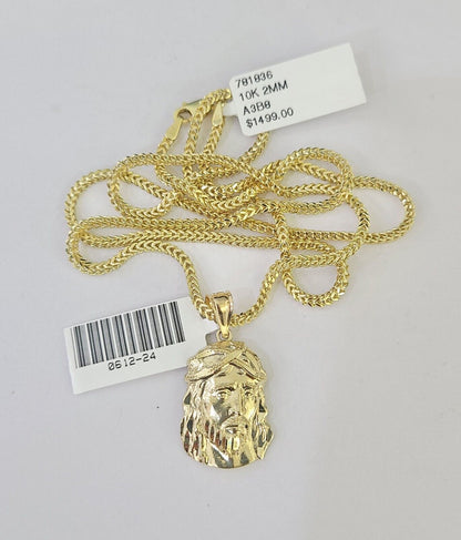 Detailed macro shot of 10K yellow gold Franco chain links